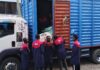 Long-distance movers from Nairobi Movers loading a truck