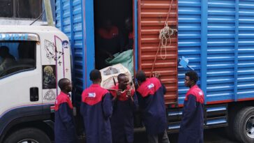 Long-distance movers from Nairobi Movers loading a truck